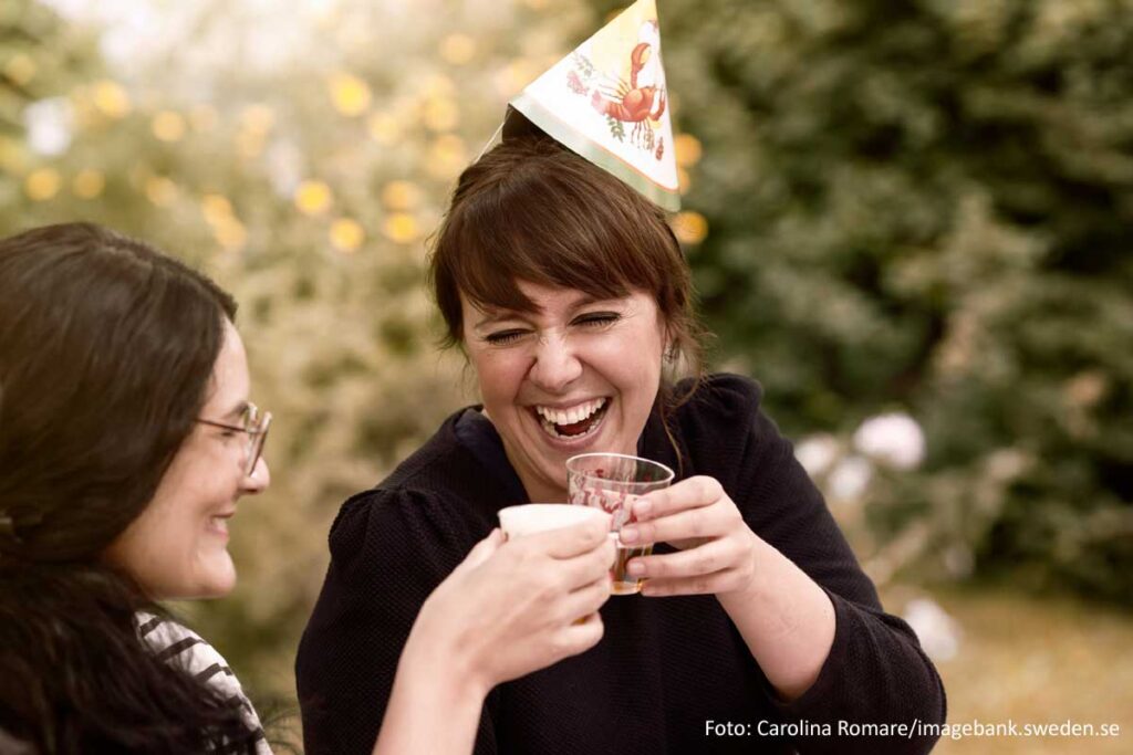 two woman cheering celebration