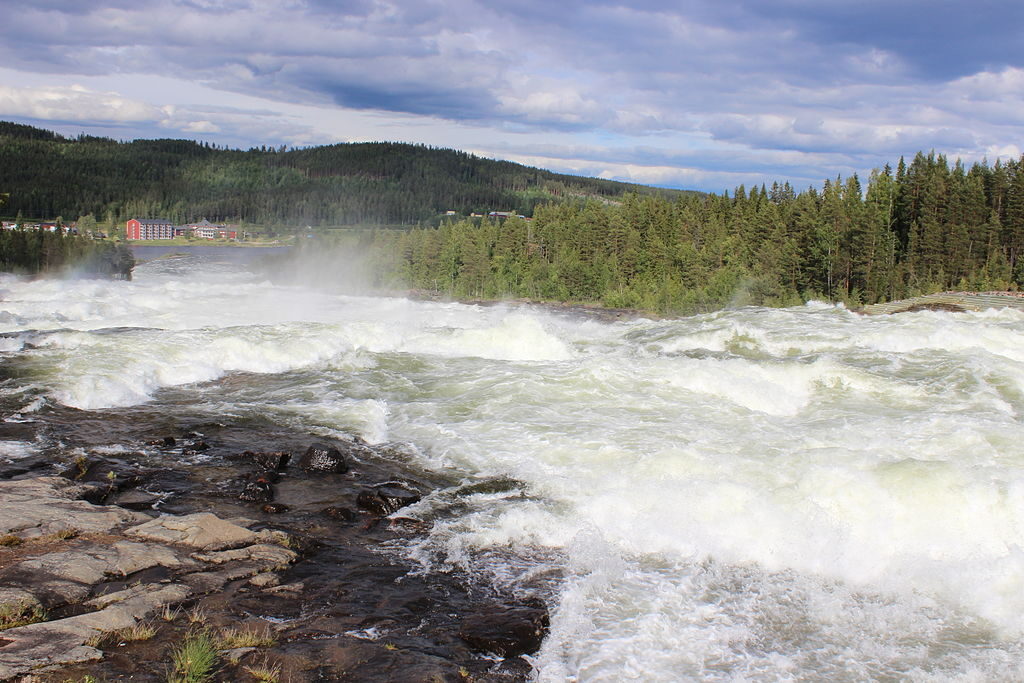 Storforsen rapids waterfall rushing water lake fast