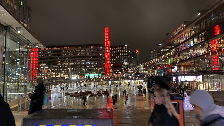 sergels torg plaza busy evening fountain lights stockholm