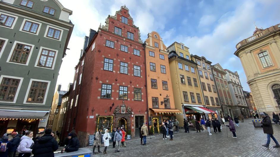 old town gamla stan colorful houses red yellow green iconic town sqaure