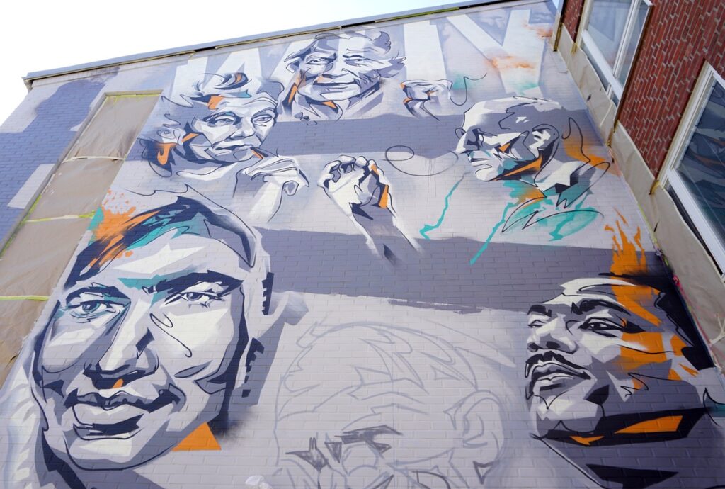 street art graffiti building faces man malmö